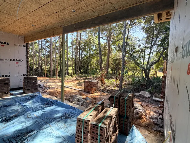 a view of a porch and garden