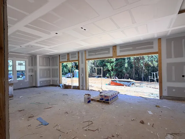 a view of a backyard of the house