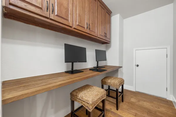 a view of a workspace with furniture