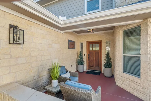 a view of a entryway door front of house