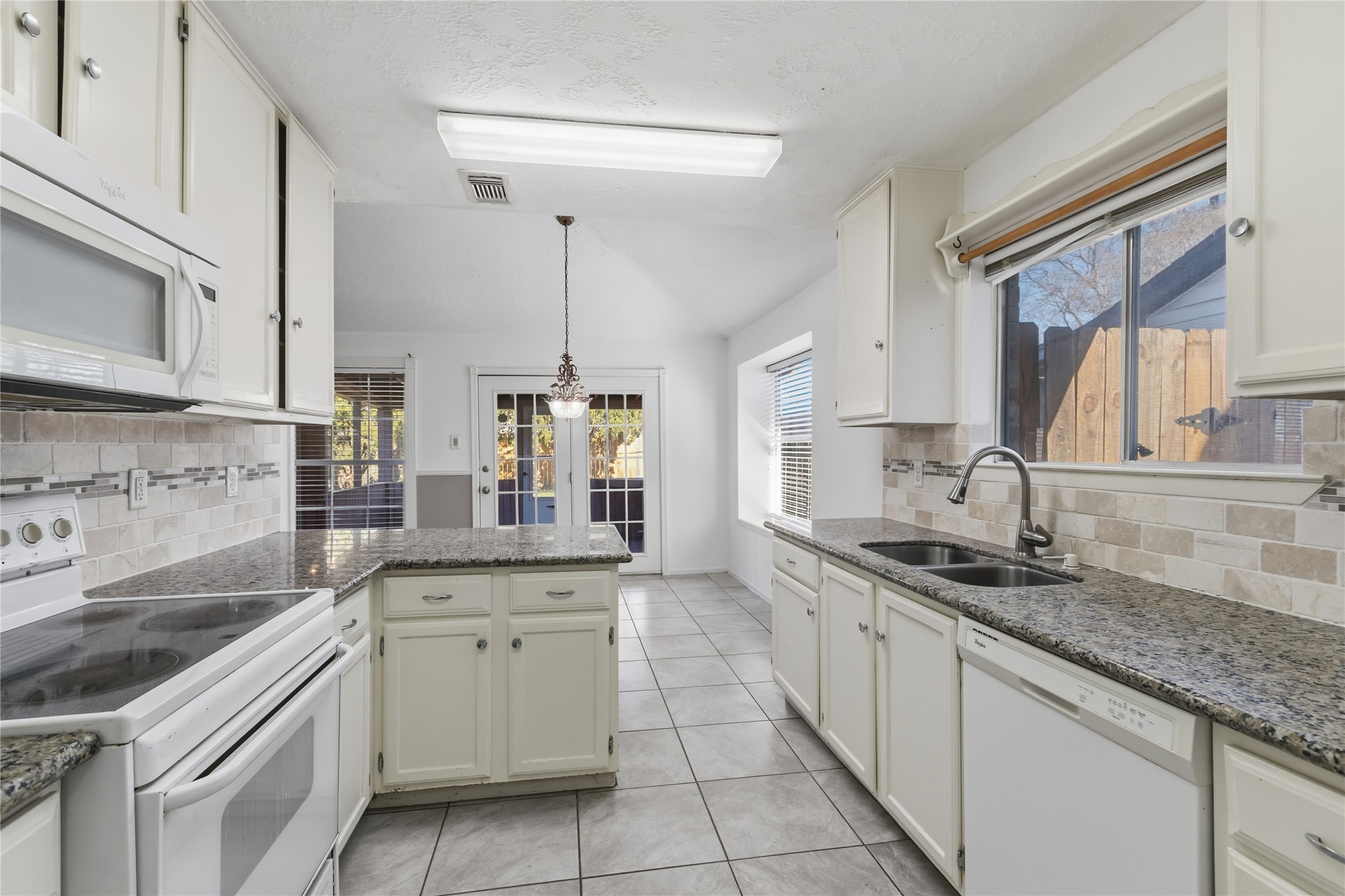 10922 Fallbrook Drive Houston, TX 77064 - Photo 11 of 28 This view is from the garage coming into the house.