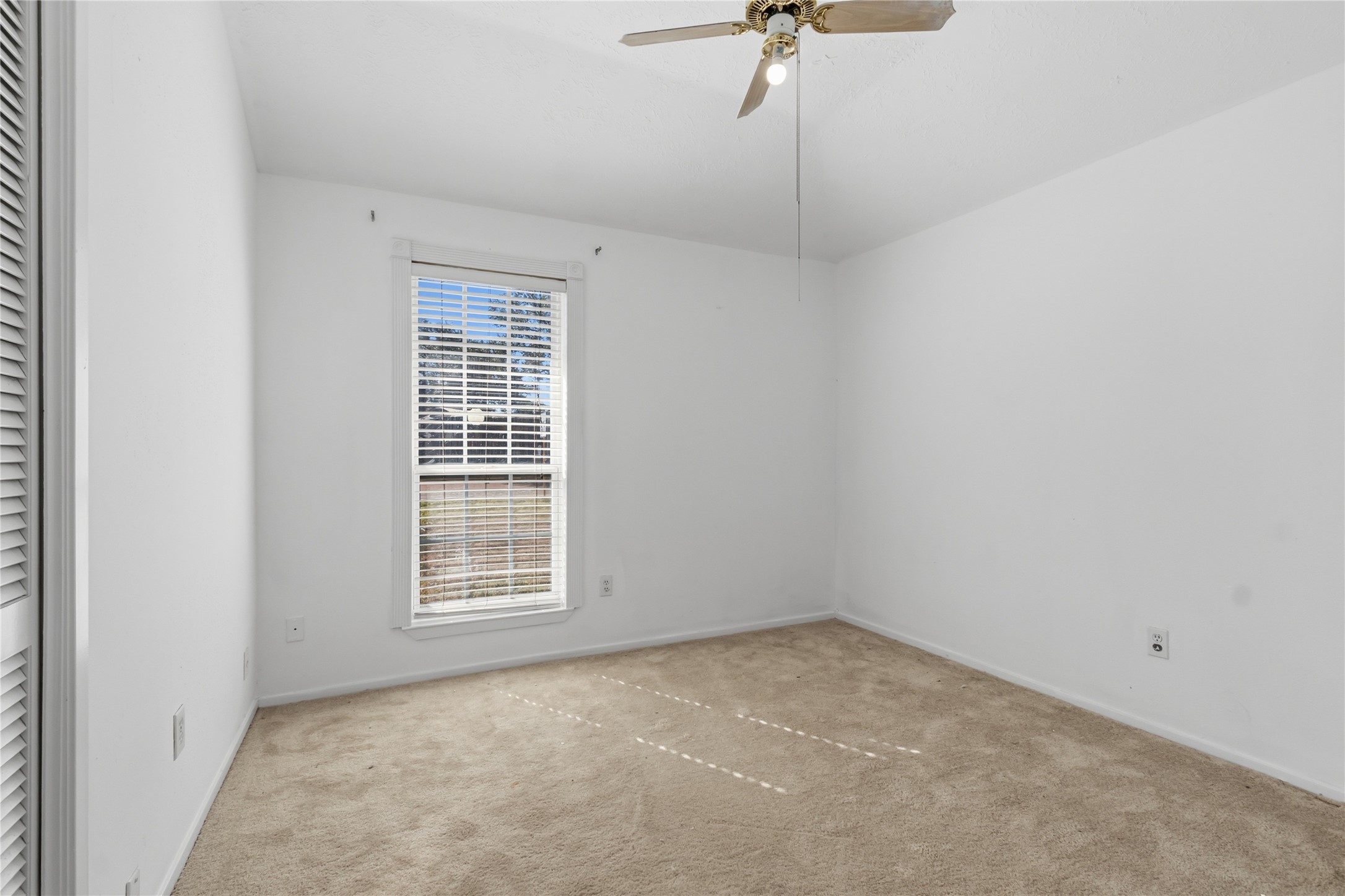 10922 Fallbrook Drive Houston, TX 77064 - Photo 17 of 28 Here is the third bedroom with ample room for bed furniture.