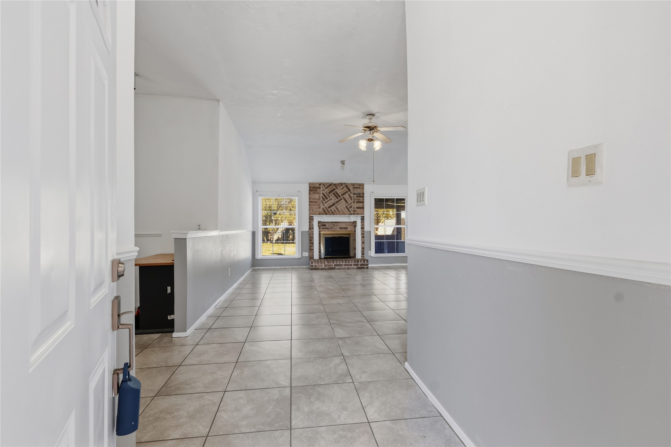 10922 Fallbrook Drive Houston, TX 77064 - Photo 3 of 28 Here is the view of the Living room. The bedrooms are to the left.