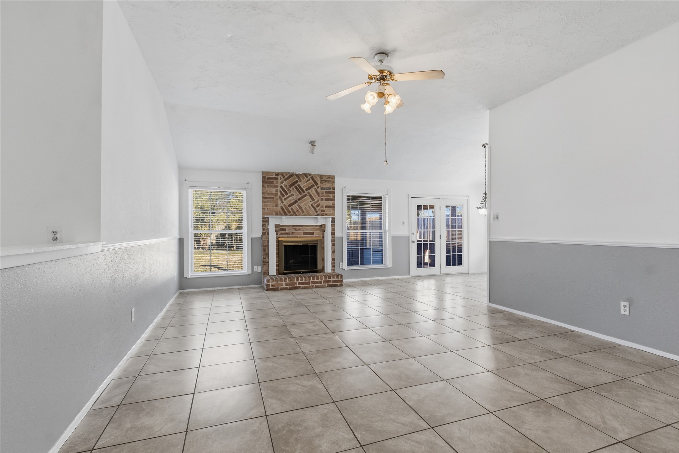 10922 Fallbrook Drive Houston, TX 77064 - Photo 4 of 28 You can see the doors to the backyard porch and kitchen dining area.