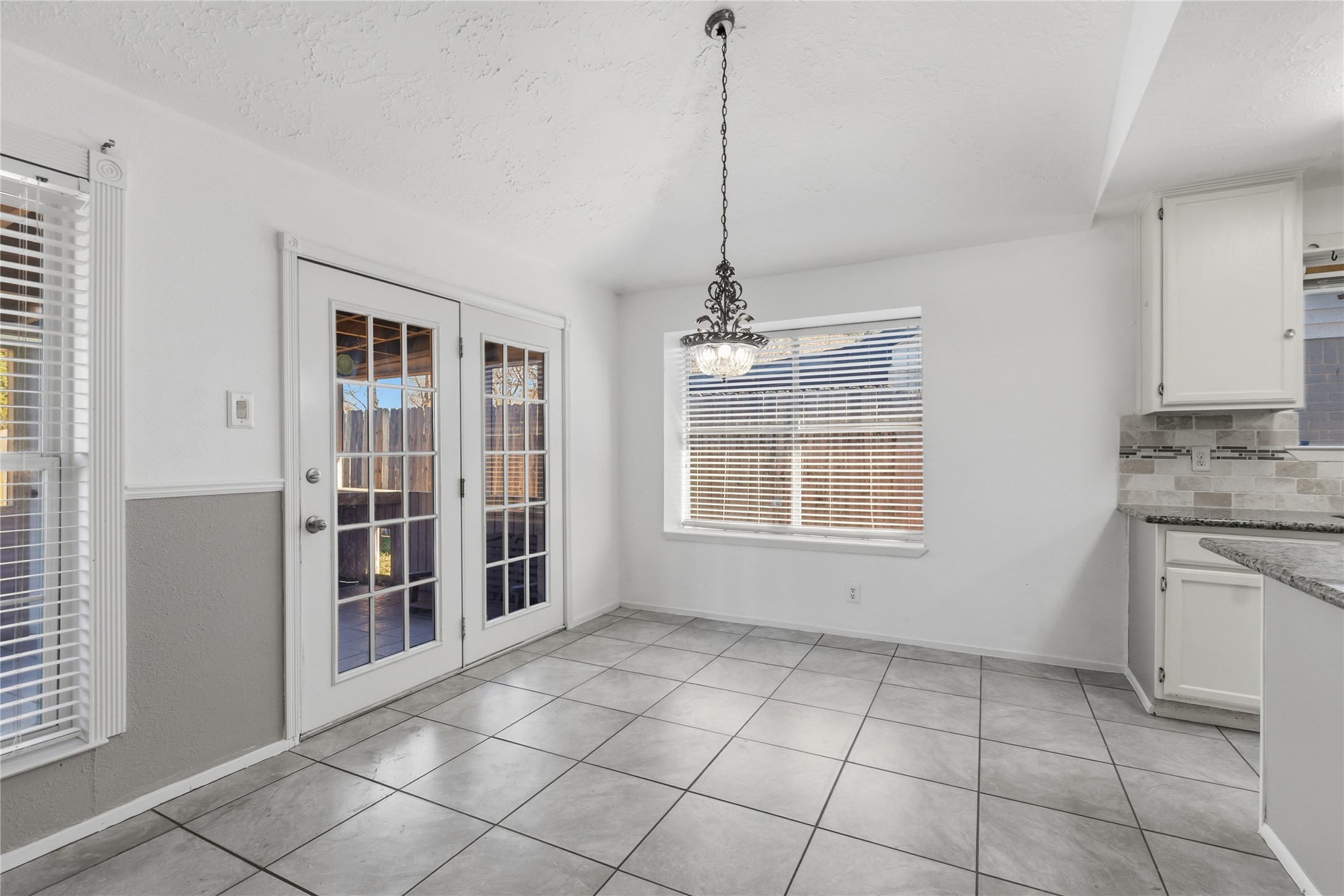 10922 Fallbrook Drive Houston, TX 77064 - Photo 8 of 28 A beautiful light for the table of your choice by the back porch, enjoy.