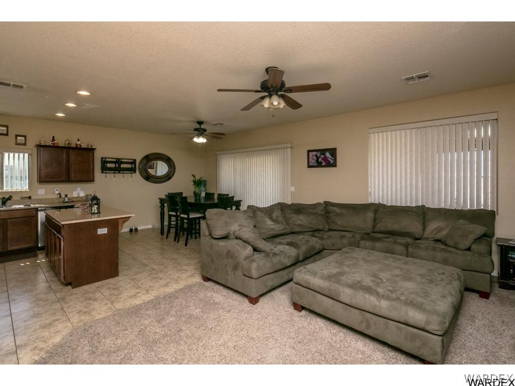 4909 North Neal Ranch Road Kingman, AZ 86401 - Photo 6 of 36 a living room with furniture kitchen and a window