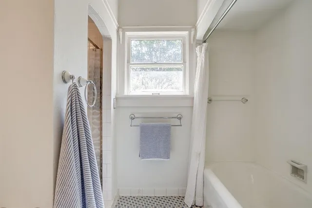 a bathroom with a bathtub
