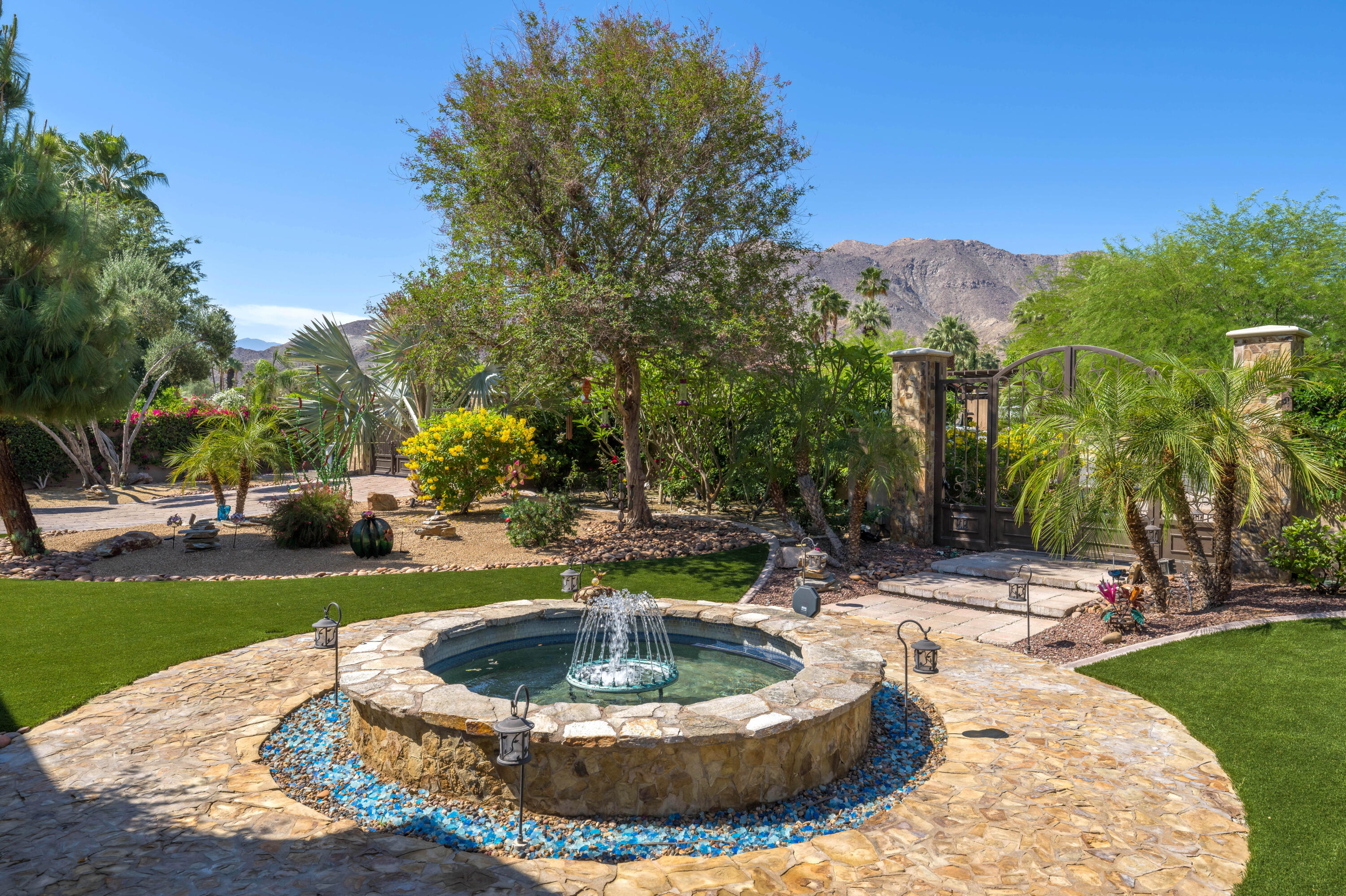 71510 San Gorgonio Road Rancho Mirage, CA 92270 - Photo 20 of 74 a view of a water fountain in the middle of a yard