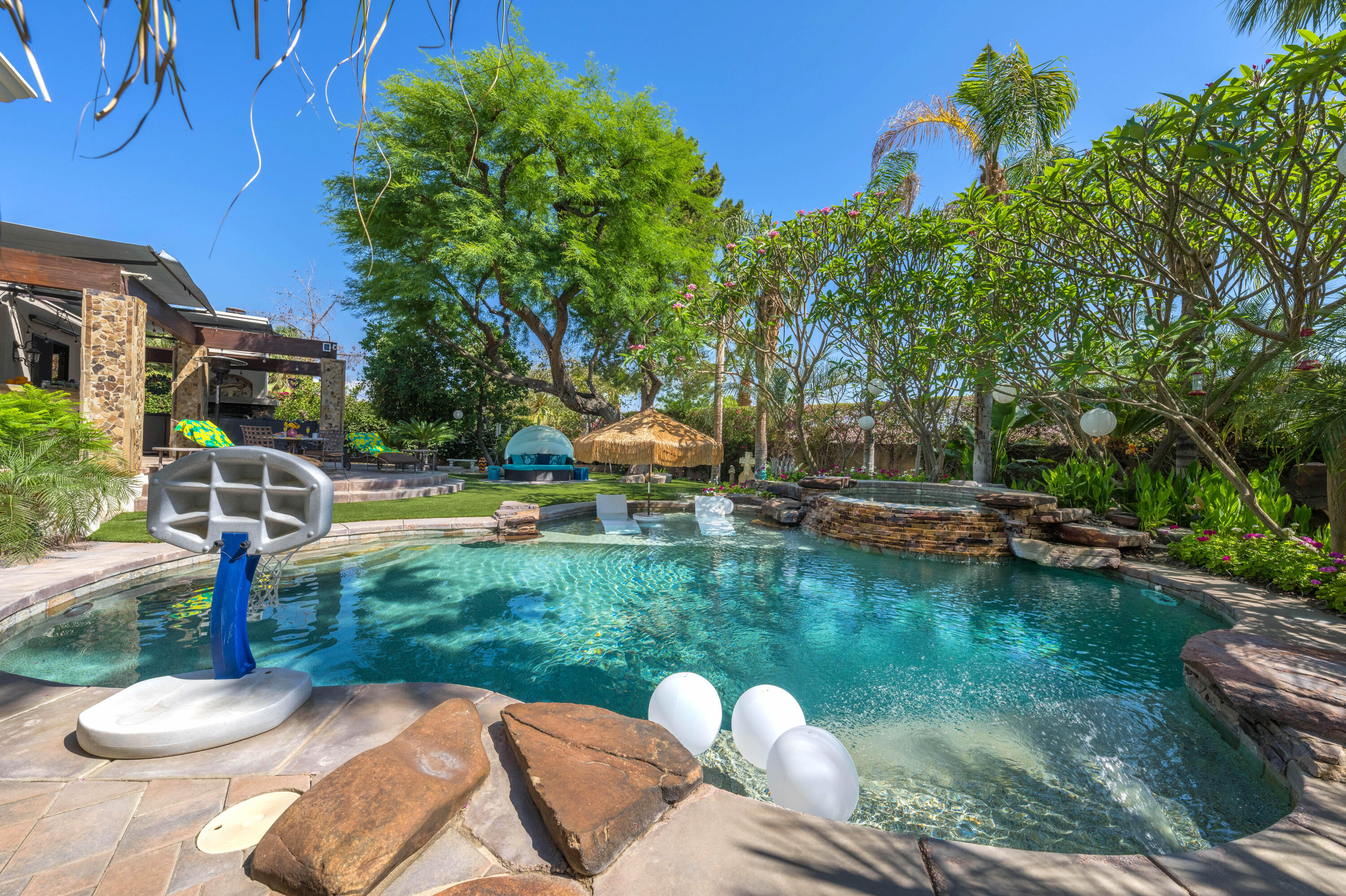 71510 San Gorgonio Road Rancho Mirage, CA 92270 - Photo 26 of 74 a view of a swimming pool with a patio