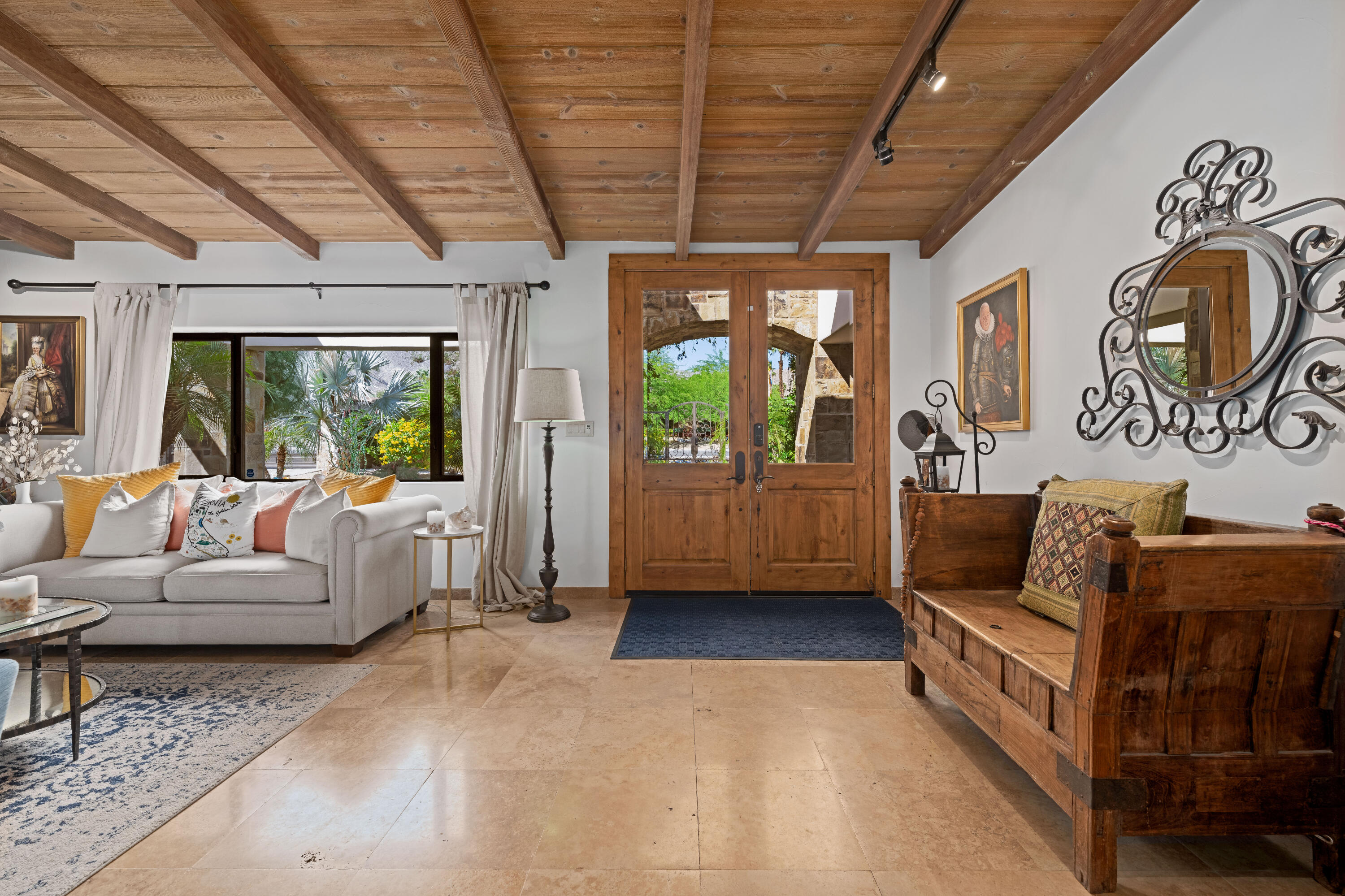 71510 San Gorgonio Road Rancho Mirage, CA 92270 - Photo 34 of 74 a living room with furniture and a large window