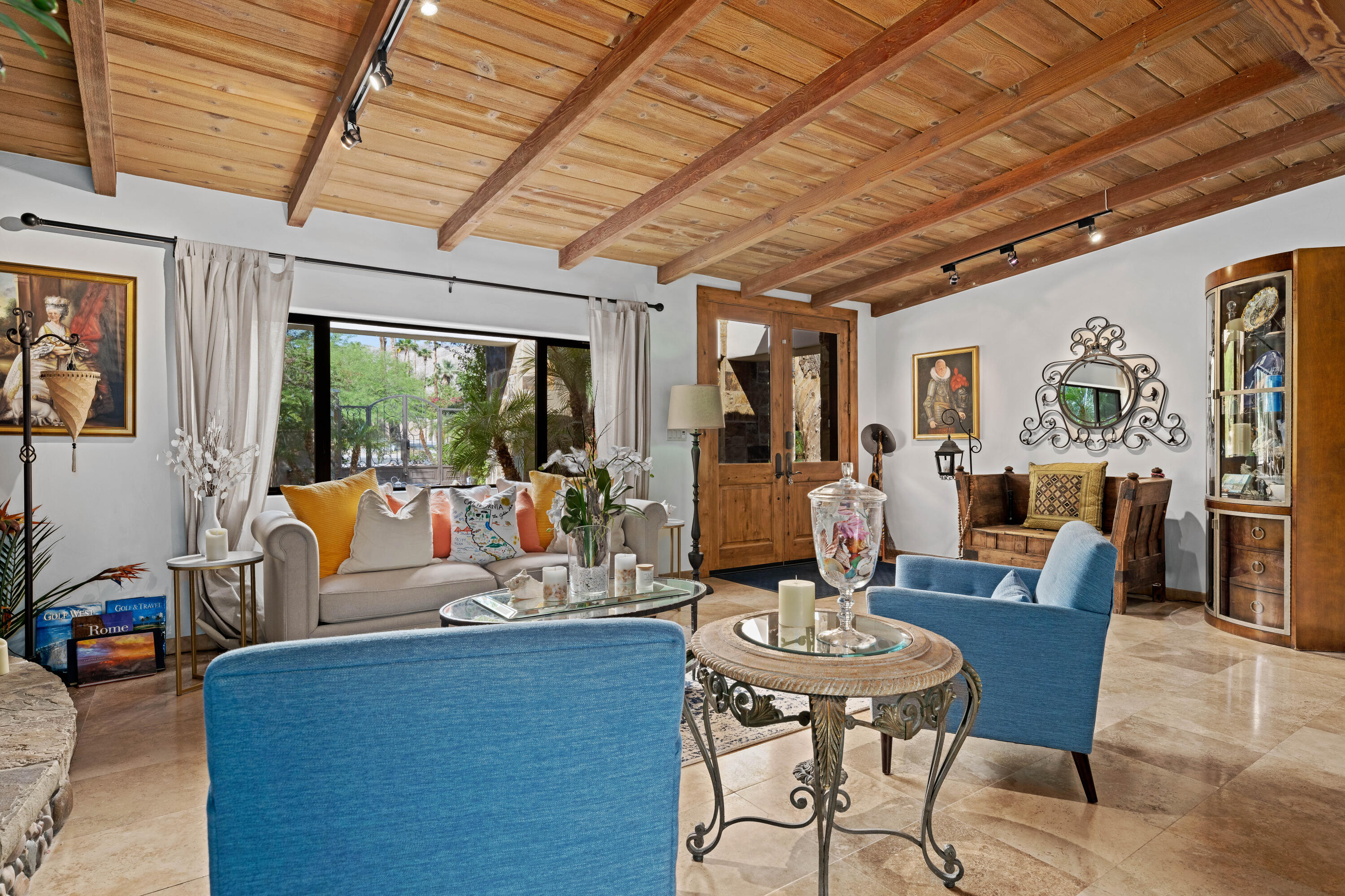 71510 San Gorgonio Road Rancho Mirage, CA 92270 - Photo 4 of 74 a view of a dining room with furniture large windows and wooden floor