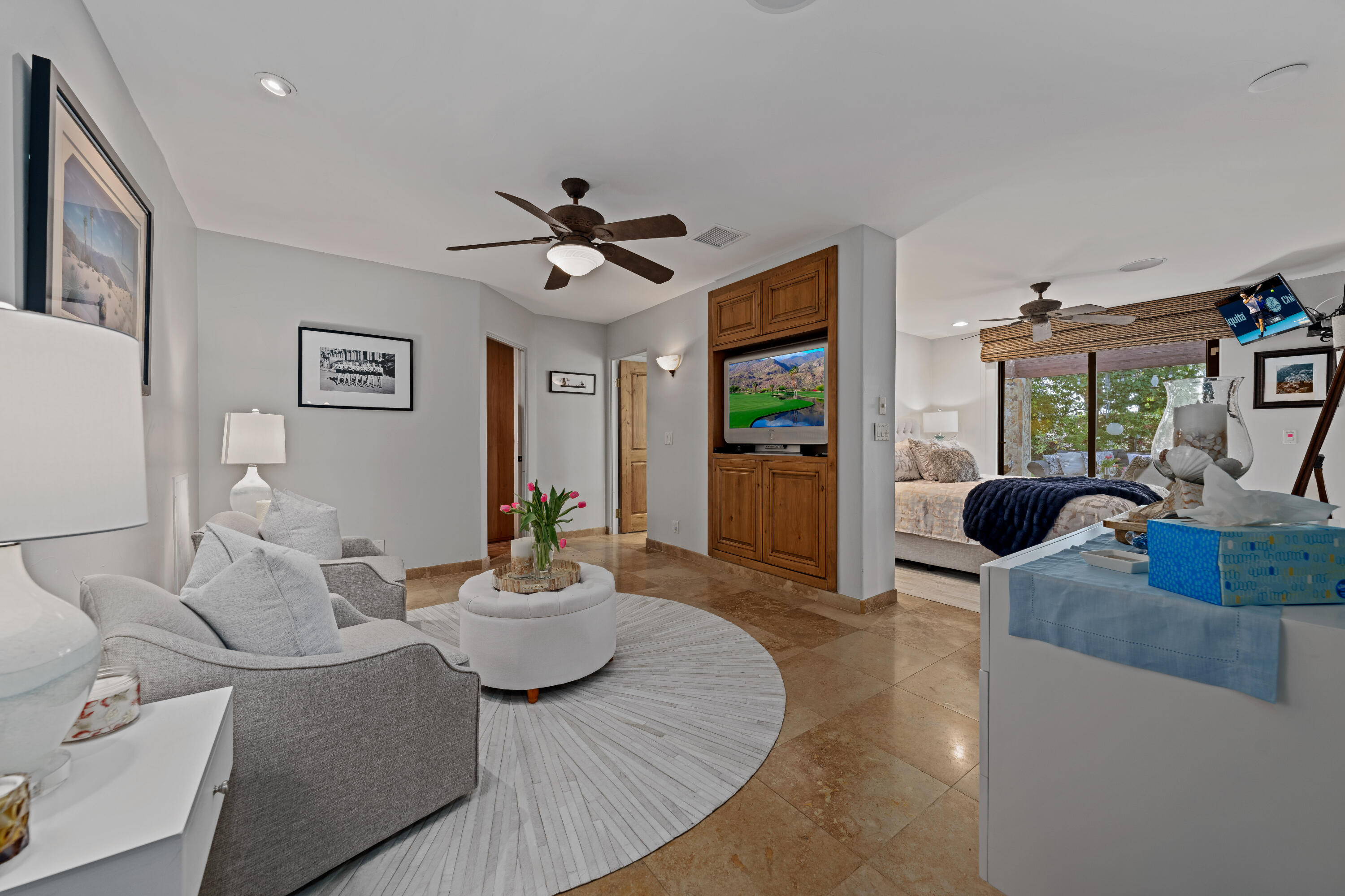 71510 San Gorgonio Road Rancho Mirage, CA 92270 - Photo 49 of 74 a living room with furniture and a flat screen tv