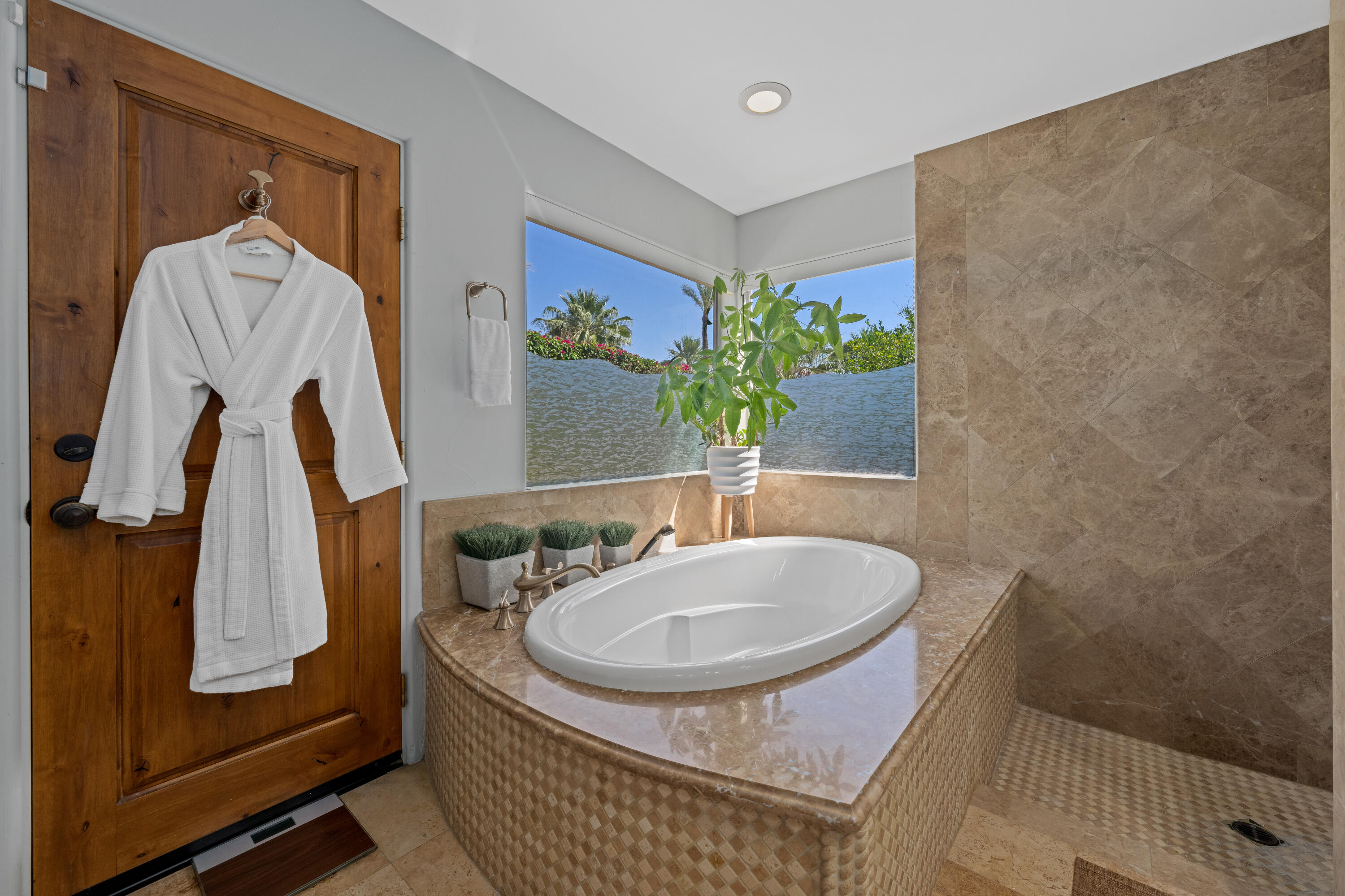 71510 San Gorgonio Road Rancho Mirage, CA 92270 - Photo 53 of 74 a bathroom with a sink and a mirror