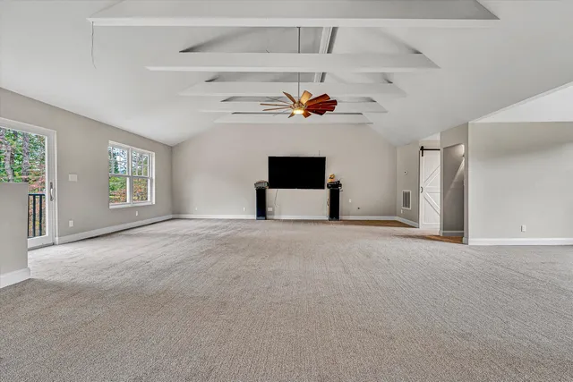 a kitchen with a refrigerator and a sink