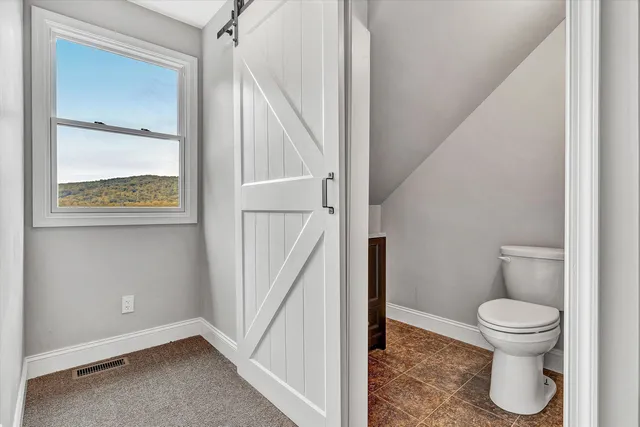 a view of a backyard and a park