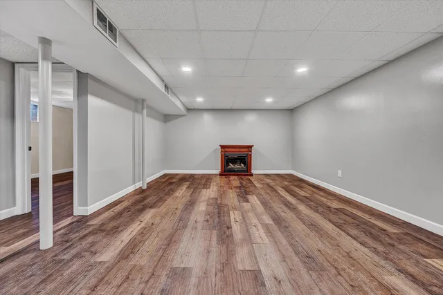 an aerial view of a house with a garden