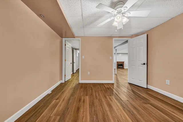 a view of a swimming pool with a yard