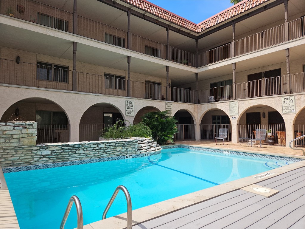 505 West 7th Street, Unit 108 Austin, TX 78701 - Photo 15 of 18 a view of a building with outdoor seating