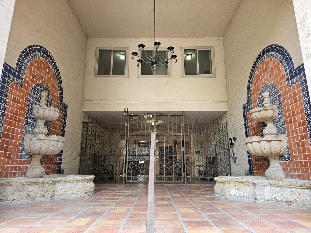 505 West 7th Street, Unit 108 Austin, TX 78701 - Photo 2 of 18 a front view of a house