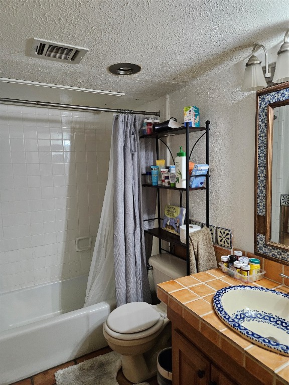 505 West 7th Street, Unit 108 Austin, TX 78701 - Photo 7 of 18 a bathroom with a granite countertop sink toilet and shower