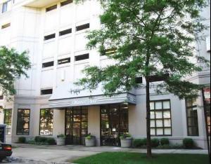 33 West Delaware Place, Unit 19F Chicago, IL 60610 - Photo 1 of 1 a front view of a building with garden