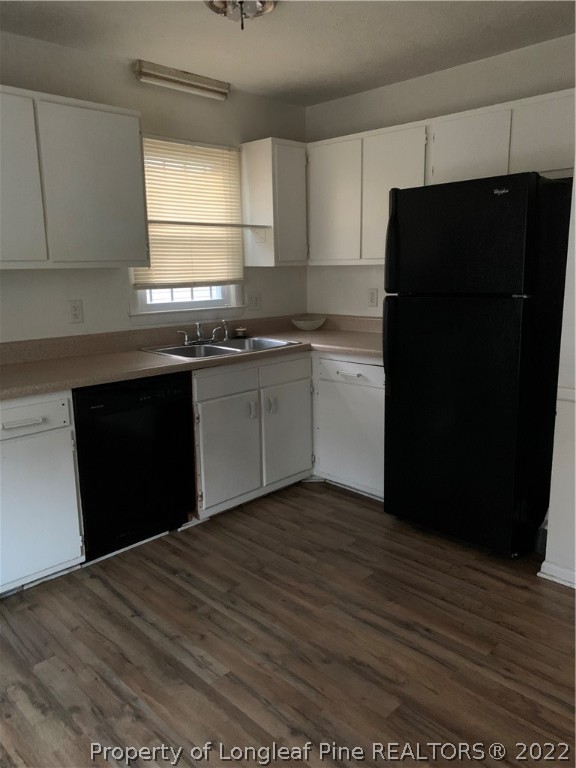 3309 Arrowhead Road Spring Lake, NC 28390 - Photo 5 of 10 a kitchen with granite countertop a refrigerator and a sink