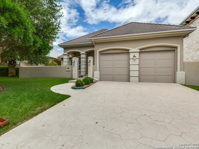 a house with yard in front of it