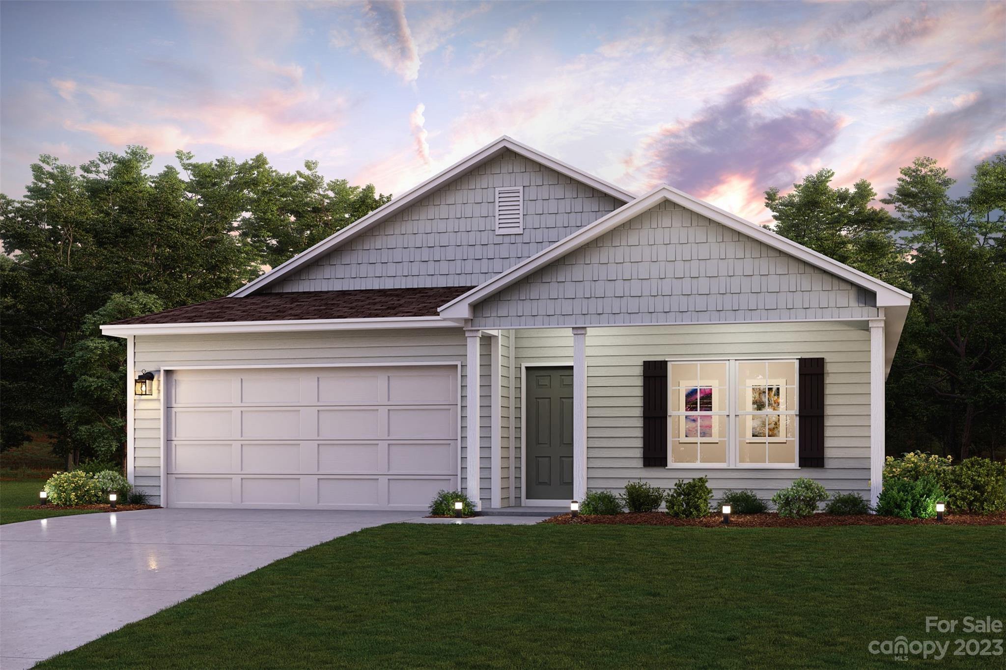 105 NEWLAND Drive Union, SC 29379 - Photo 1 of 2 a front view of a house with a garden and yard