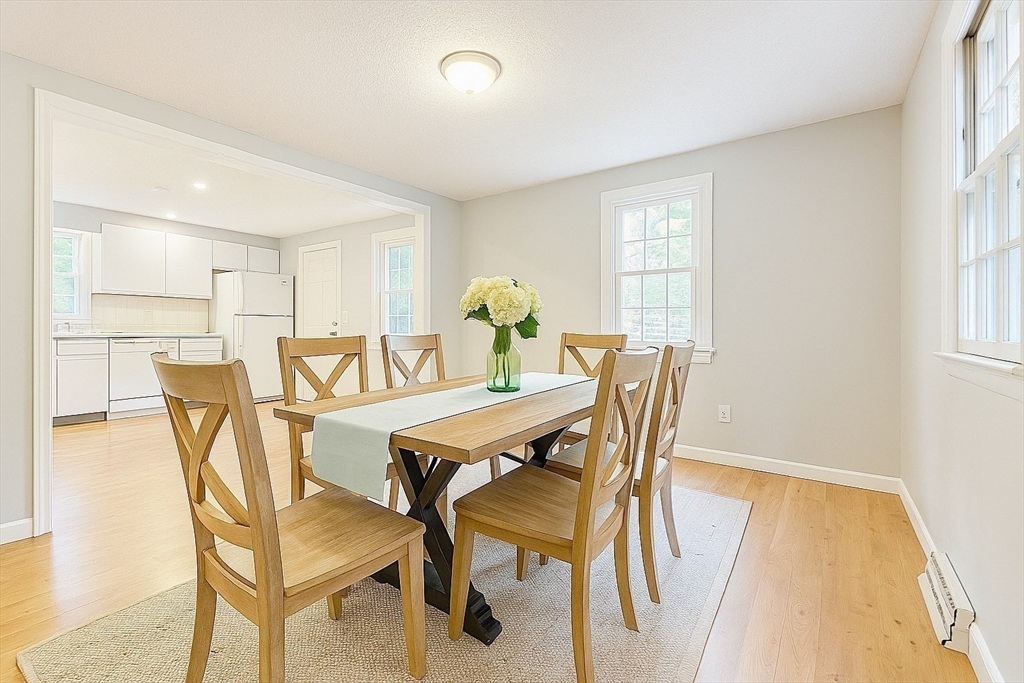 49 St Marks Road Falmouth, MA 02536 - Photo 11 of 38 a view of a dining room with furniture and window
