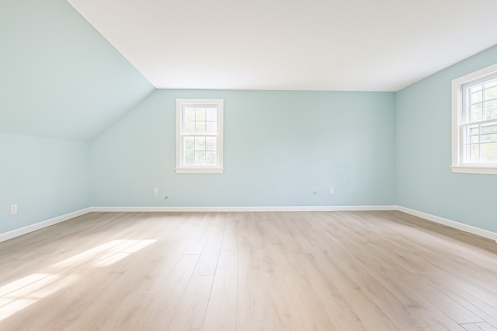 49 St Marks Road Falmouth, MA 02536 - Photo 30 of 38 an empty room with wooden floor and windows
