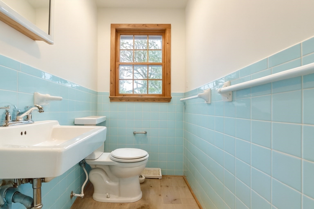 49 St Marks Road Falmouth, MA 02536 - Photo 36 of 38 a bathroom with a sink and a toilet