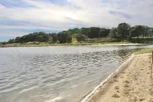 a view of a dining room with furniture and window