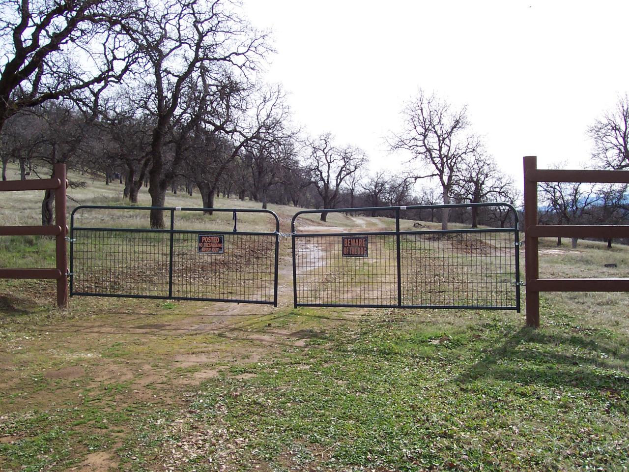 249 Fiddlers Road Igo, CA 96047 - Photo 1 of 19 a view of backyard with wooden fence