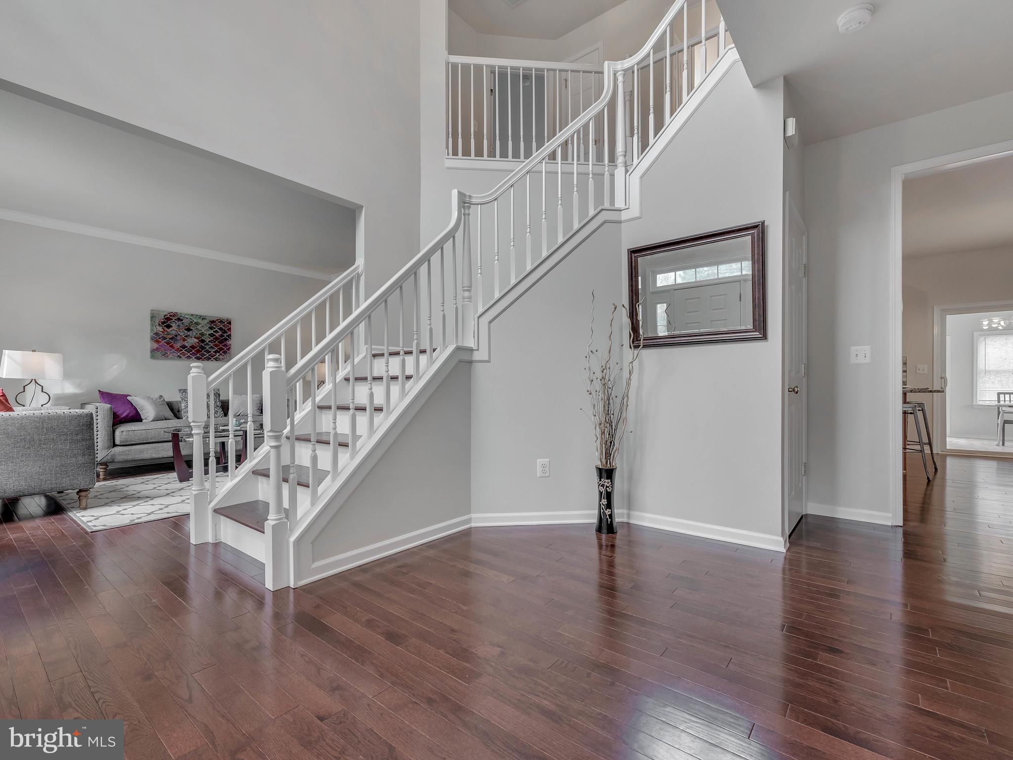 11004 Frederick Road Ellicott City, MD 21042 - Photo 2 of 30 2 story open Foyer with hard wood stairs