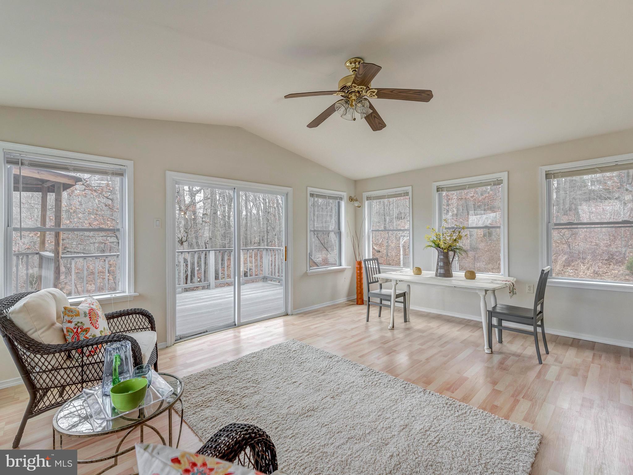 11004 Frederick Road Ellicott City, MD 21042 - Photo 12 of 30 Huge and bright Sun room with nice wood view