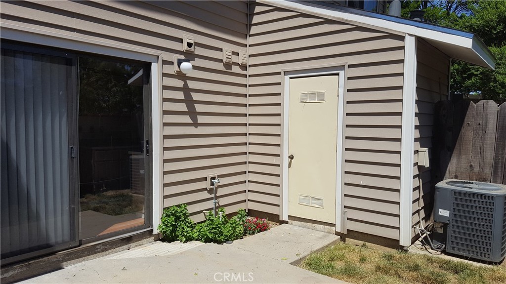 565 North Street Corning, CA 96021 - Photo 24 of 30 Backyard Patio and Water Heater Closet.