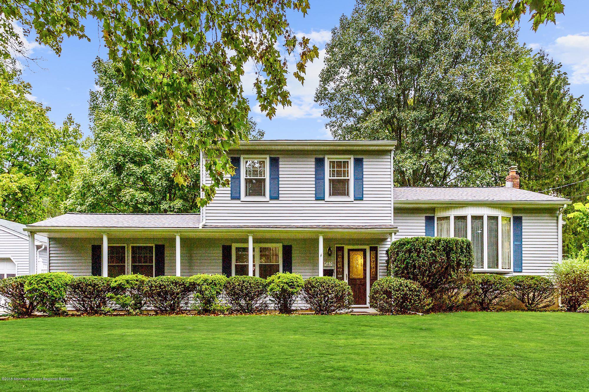 3 East Point Road Lincroft, NJ 07738 - Photo 1 of 42 a front view of a house with garden and plants