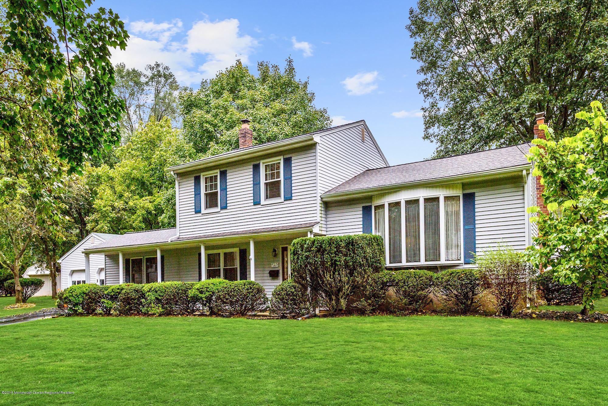 3 East Point Road Lincroft, NJ 07738 - Photo 2 of 42 a front view of a house with a yard