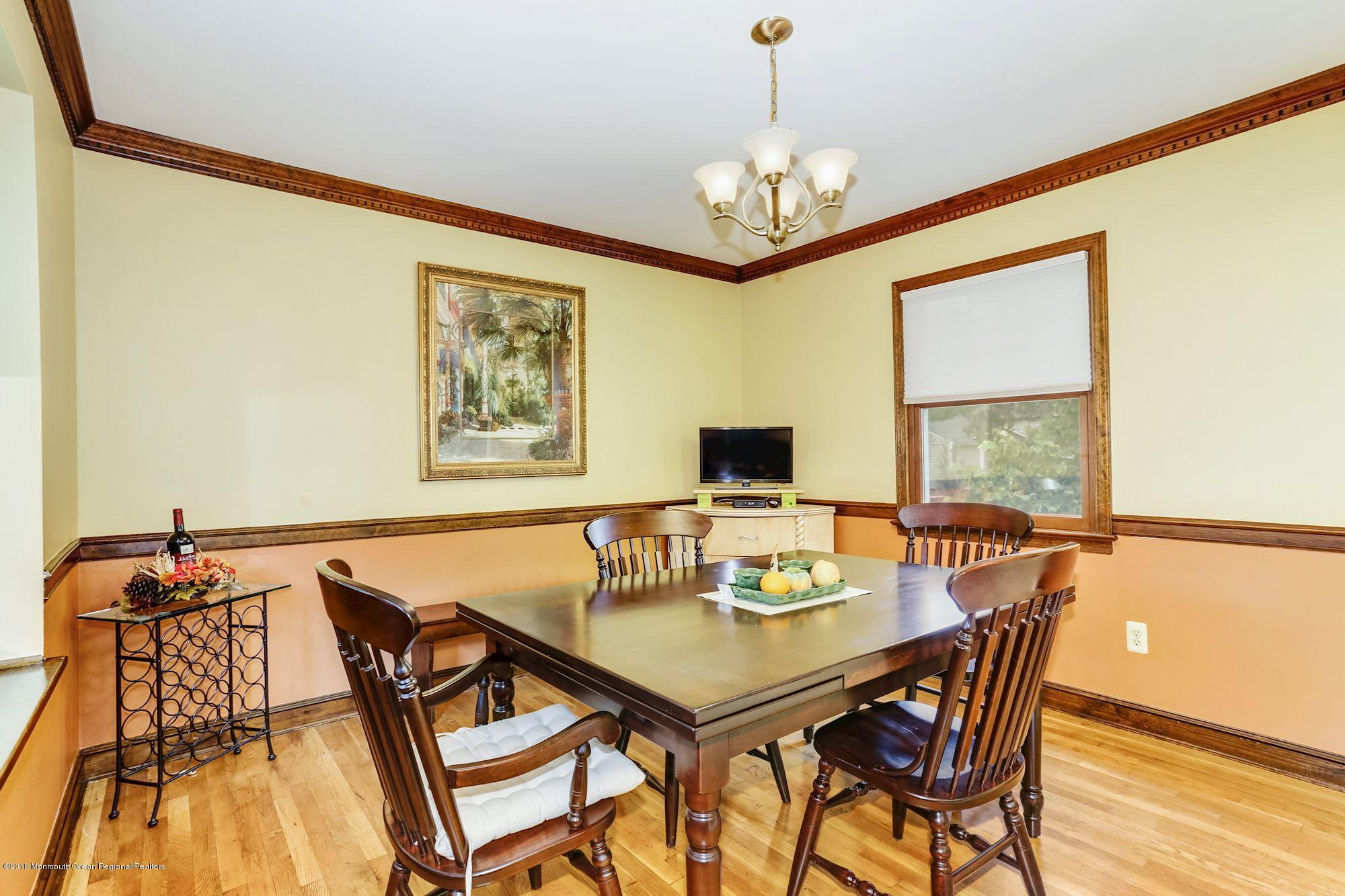 3 East Point Road Lincroft, NJ 07738 - Photo 18 of 42 a view of a dining room with furniture window and wooden floor