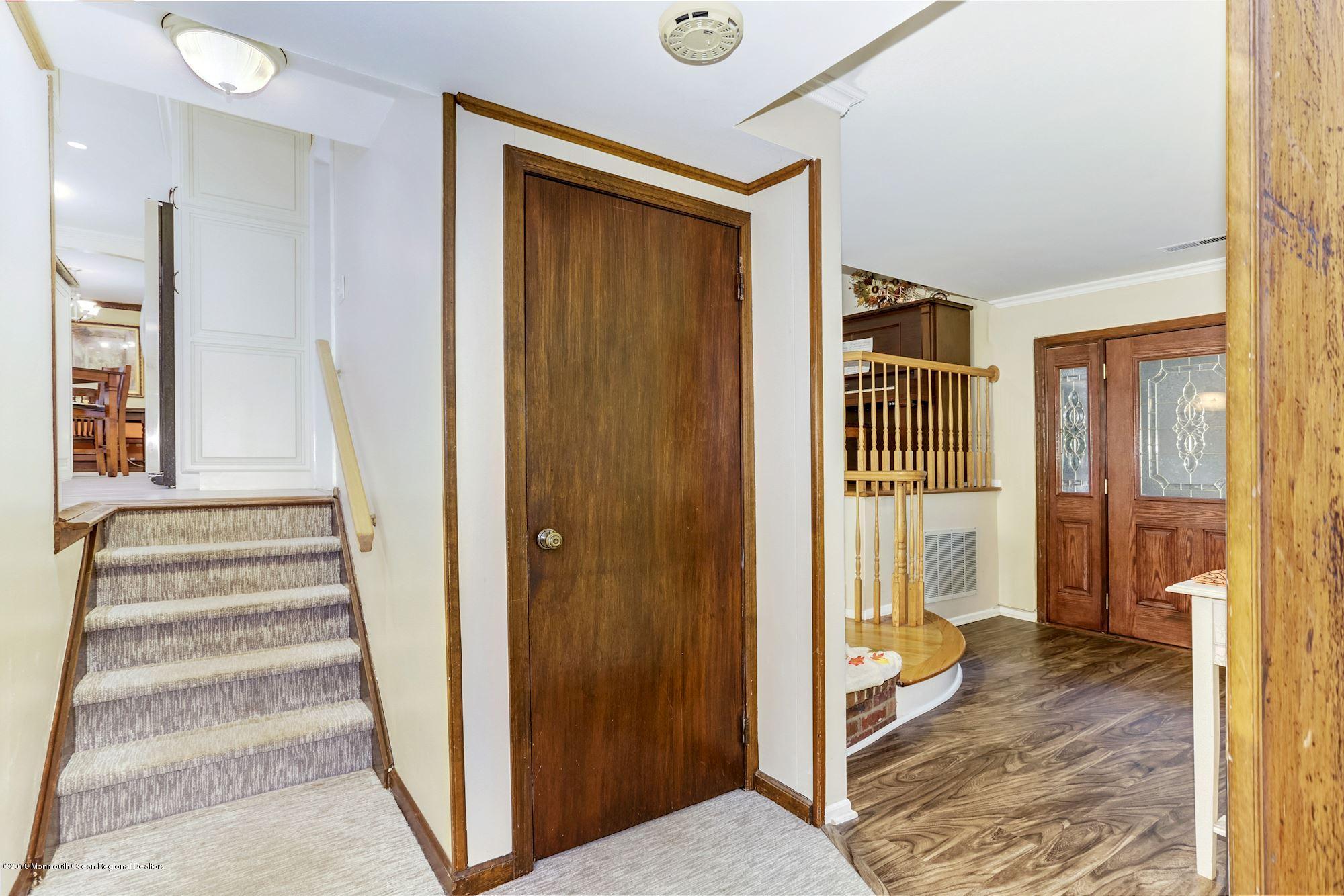 3 East Point Road Lincroft, NJ 07738 - Photo 24 of 42 a view of a hallway with a livingroom and dining room