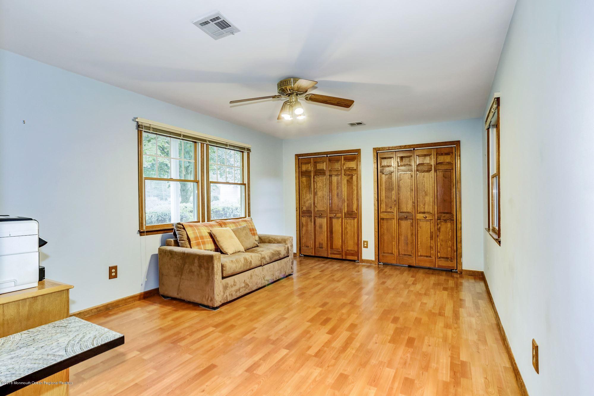 3 East Point Road Lincroft, NJ 07738 - Photo 27 of 42 a living room with furniture and a window