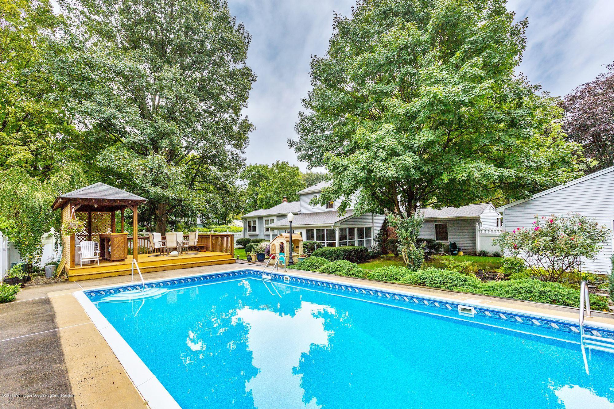 3 East Point Road Lincroft, NJ 07738 - Photo 41 of 42 swimming pool with outdoor seating and yard