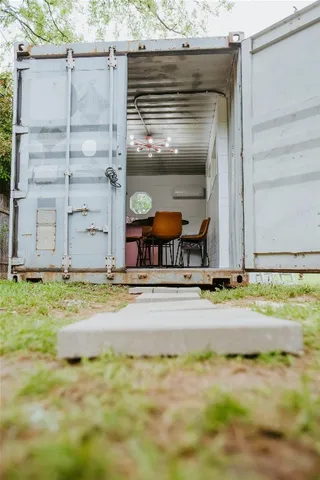 a view of a backyard of the house