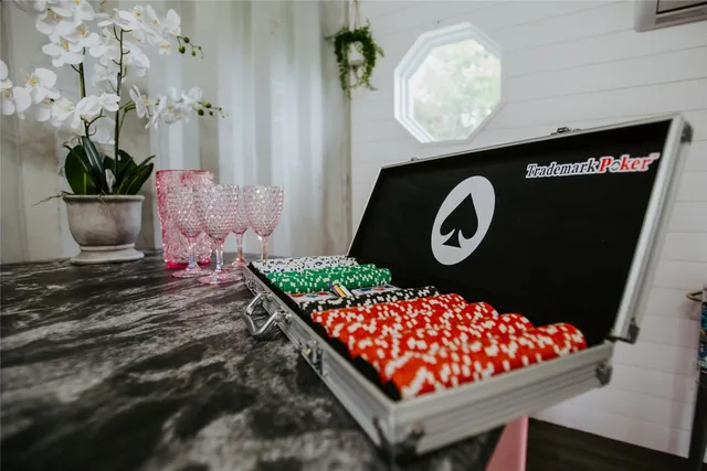 a view of dining room with wooden floor and furniture