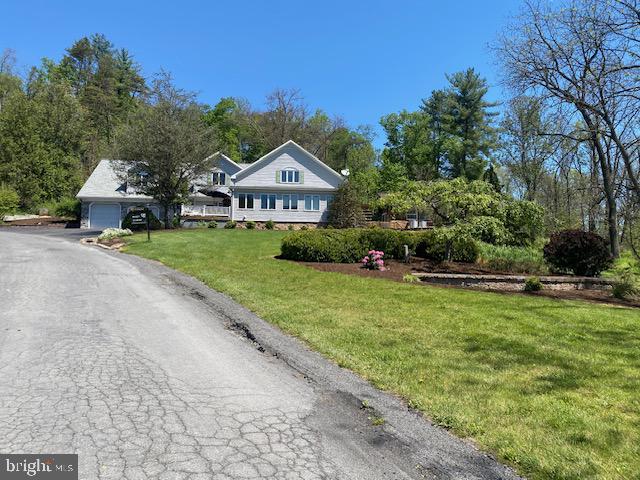 64 Metz Road Thompsontown, PA 17094 - Photo 2 of 69 Charming home nestled in lush greenery.