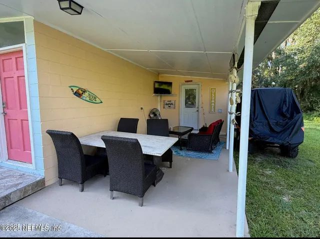 a house view with a garden space