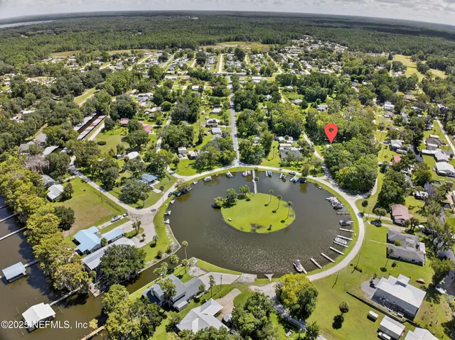 a kitchen with stainless steel appliances granite countertop a refrigerator stove and sink
