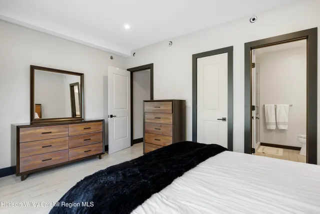 a bathroom with a sink a toilet and bathtub