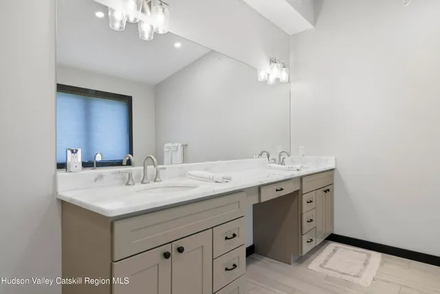 a view of a balcony with furniture