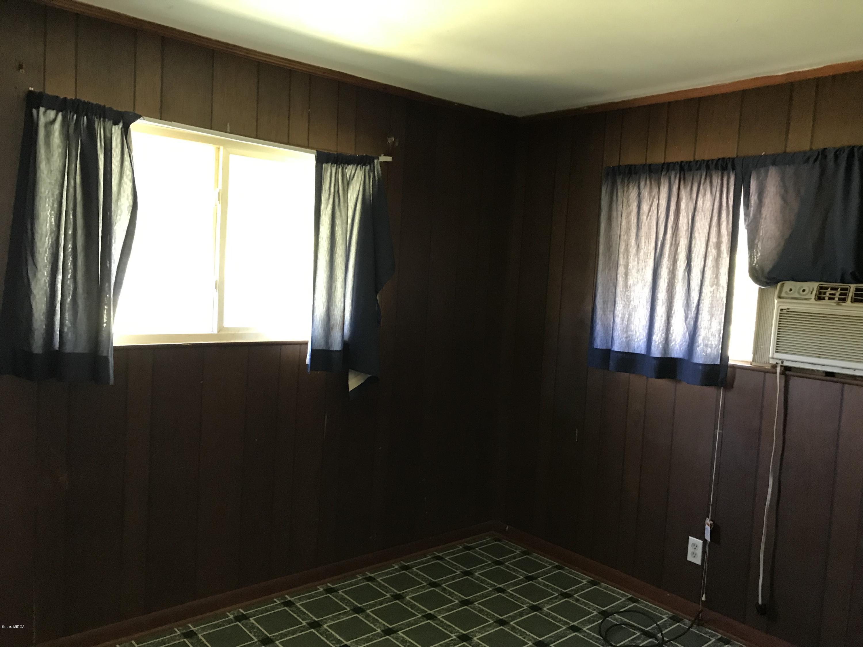 224 Chambers Road Macon, GA 31217 - Photo 6 of 16 an empty room with windows